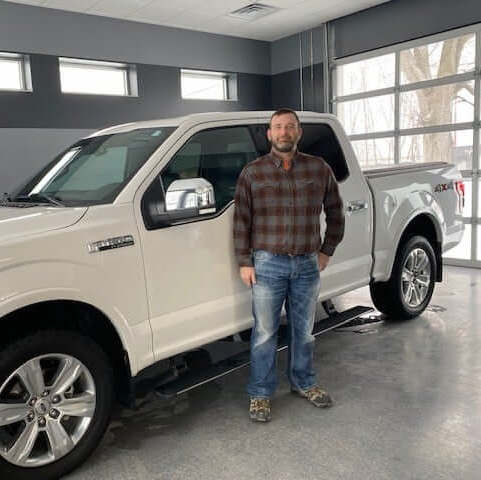 Pre-owned Ford F-150 sold to Team Auto customer
